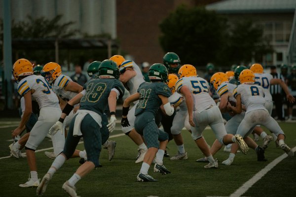 How are UK sports teams adapting to sustainability practices?